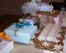 At our women's event, "The Gift of Giving", we packed Chanukah gift bags to distribute at nursing homes, sampled from a gourmet latke bar, and viewed creative ways to wrap gifts.
