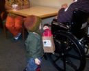 Our volunteers visited area nursing homes to deliver Chanukah gifts and good cheer.
